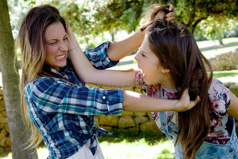Two Girls Fighting Hair Pulling Stock Photos - Free & Royalty-Free Stock  Photos From Dreamstime
